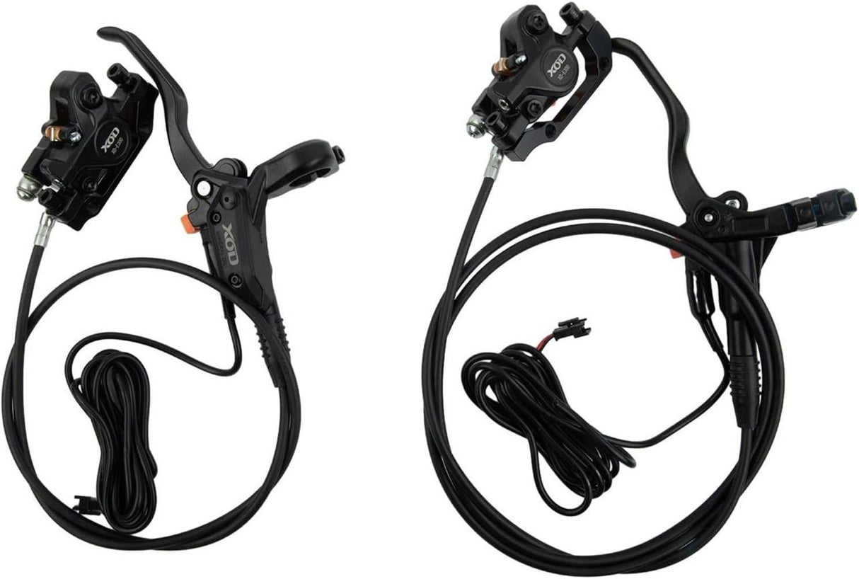Pair of black bicycle brake levers with cables