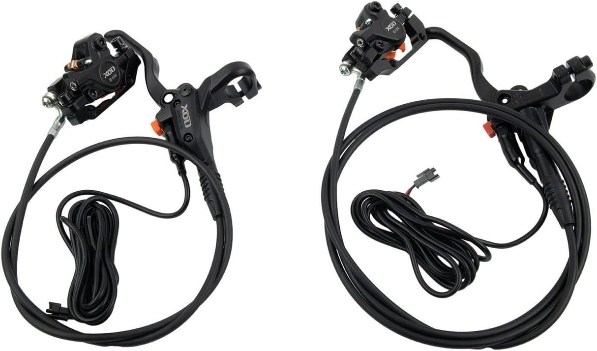 Pair of black bicycle brake levers with cables