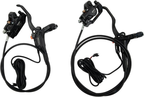 Pair of black bicycle brake levers with cables